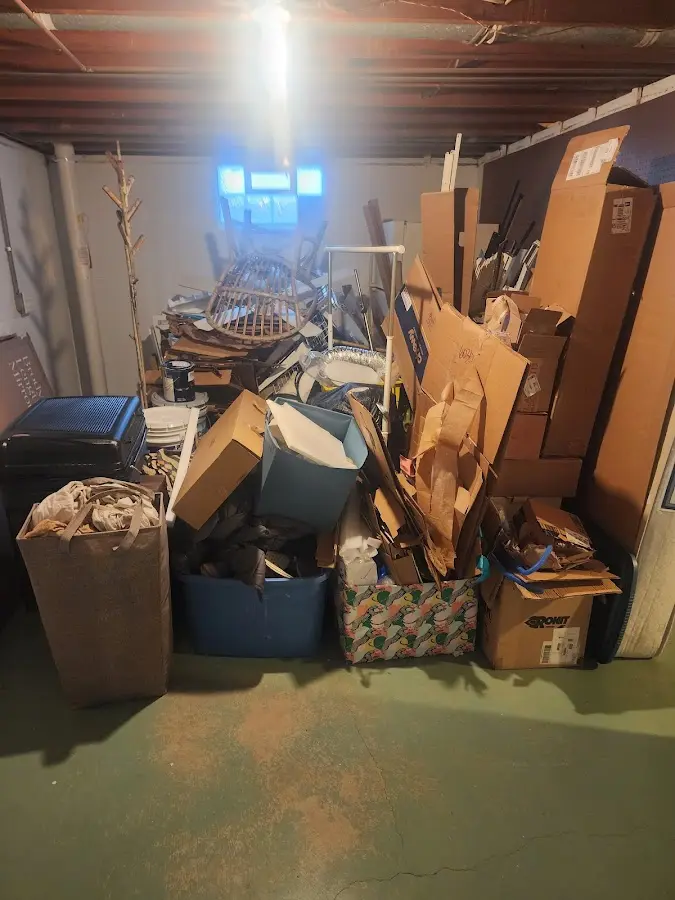 Roll-off dumpster container at job site for 4 Yard Dumpster Rental in Swartz Creek